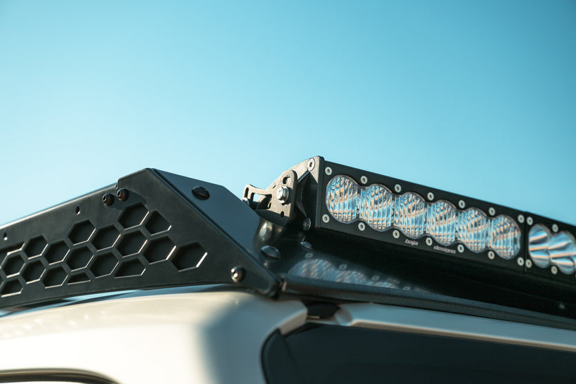 A durable aluminum Rago Roof Rack installed to a Land Cruiser 250 Series.