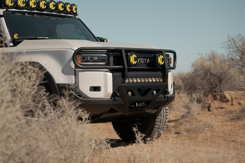 Side angle shot of the Center Mount Winch Front Bumper and Brush Guard for the 250 Series Land Cruiser